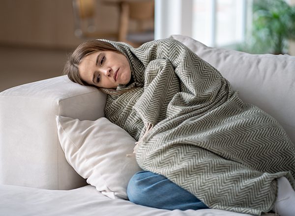 A young woman at home, depleted